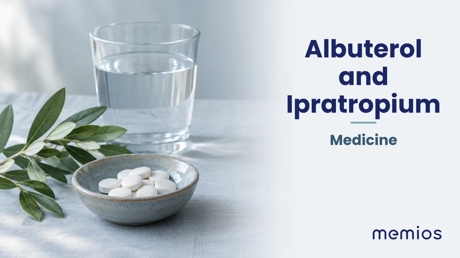 Photograph for Albuterol and Ipratropium: plain unmarked tablets in a dish beside a glass of water on pale linen.