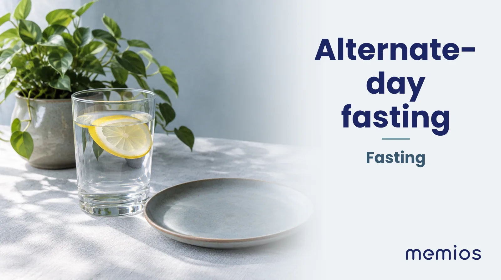 Photograph for Alternate-day fasting: a calm table with an empty plate and a glass of water in morning light.