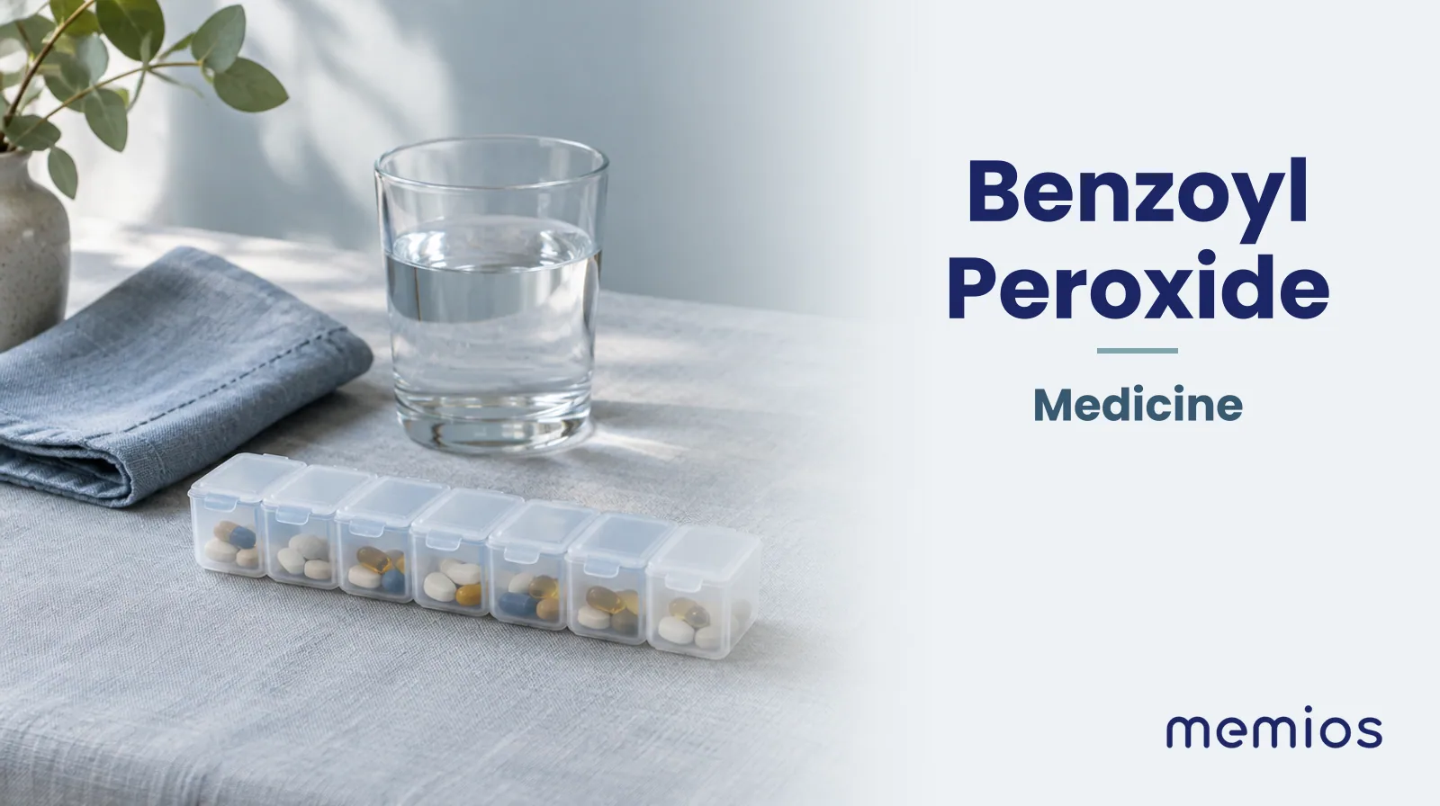 Photograph for Benzoyl Peroxide: plain unmarked tablets in a dish beside a glass of water on pale linen.