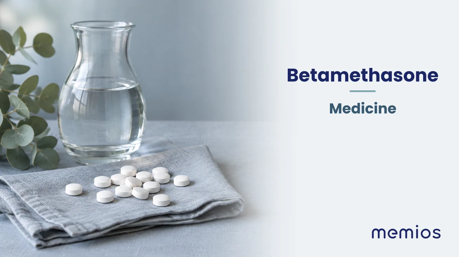 Photograph for Betamethasone: plain unmarked tablets in a dish beside a glass of water on pale linen.