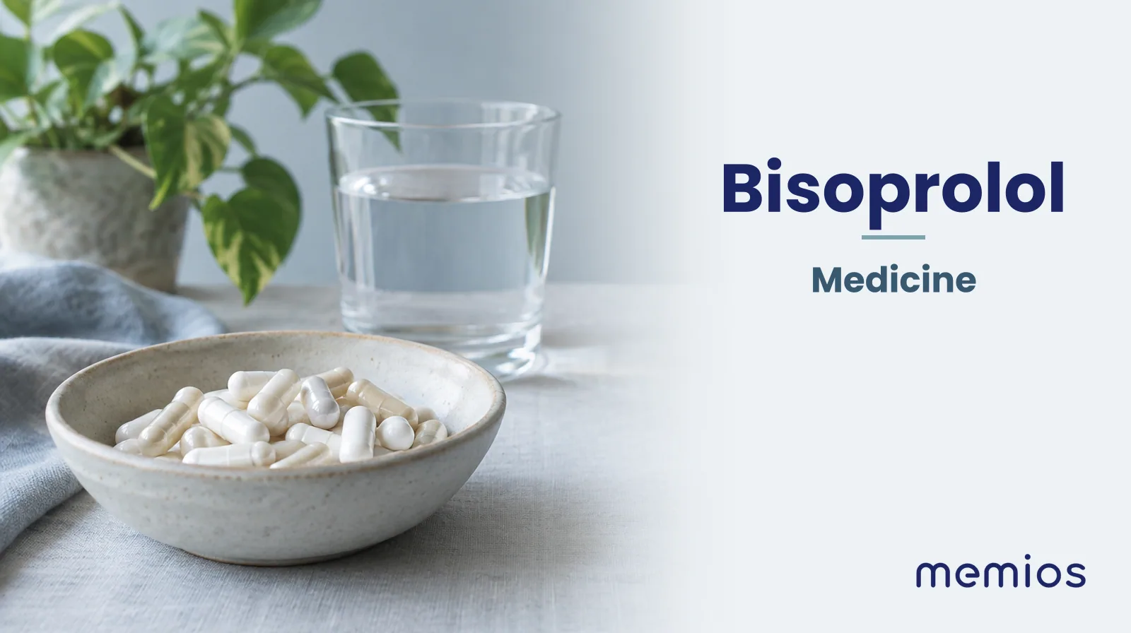 Photograph for Bisoprolol: plain unmarked tablets in a dish beside a glass of water on pale linen.