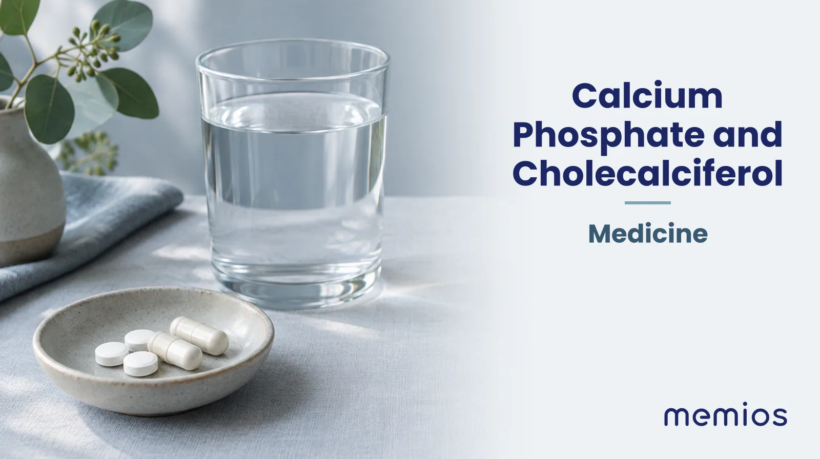 Photograph for Calcium Phosphate and Cholecalciferol: plain unmarked tablets in a dish beside a glass of water on pale linen.