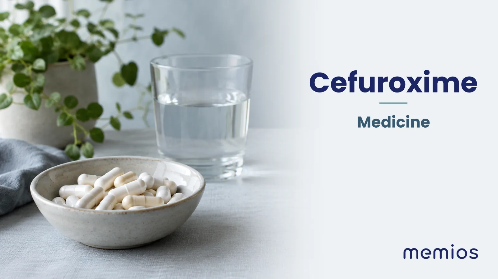 Photograph for Cefuroxime: plain unmarked tablets in a dish beside a glass of water on pale linen.