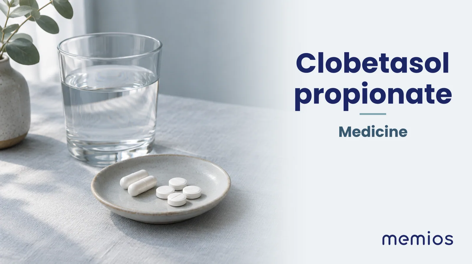 Photograph for Clobetasol propionate: plain unmarked tablets in a dish beside a glass of water on pale linen.