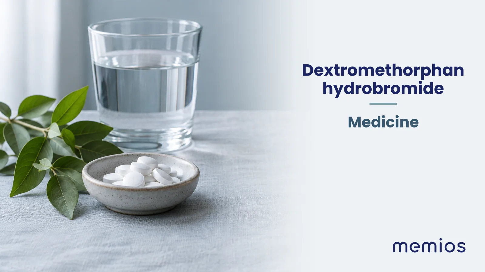 Photograph for Dextromethorphan hydrobromide: plain unmarked tablets in a dish beside a glass of water on pale linen.