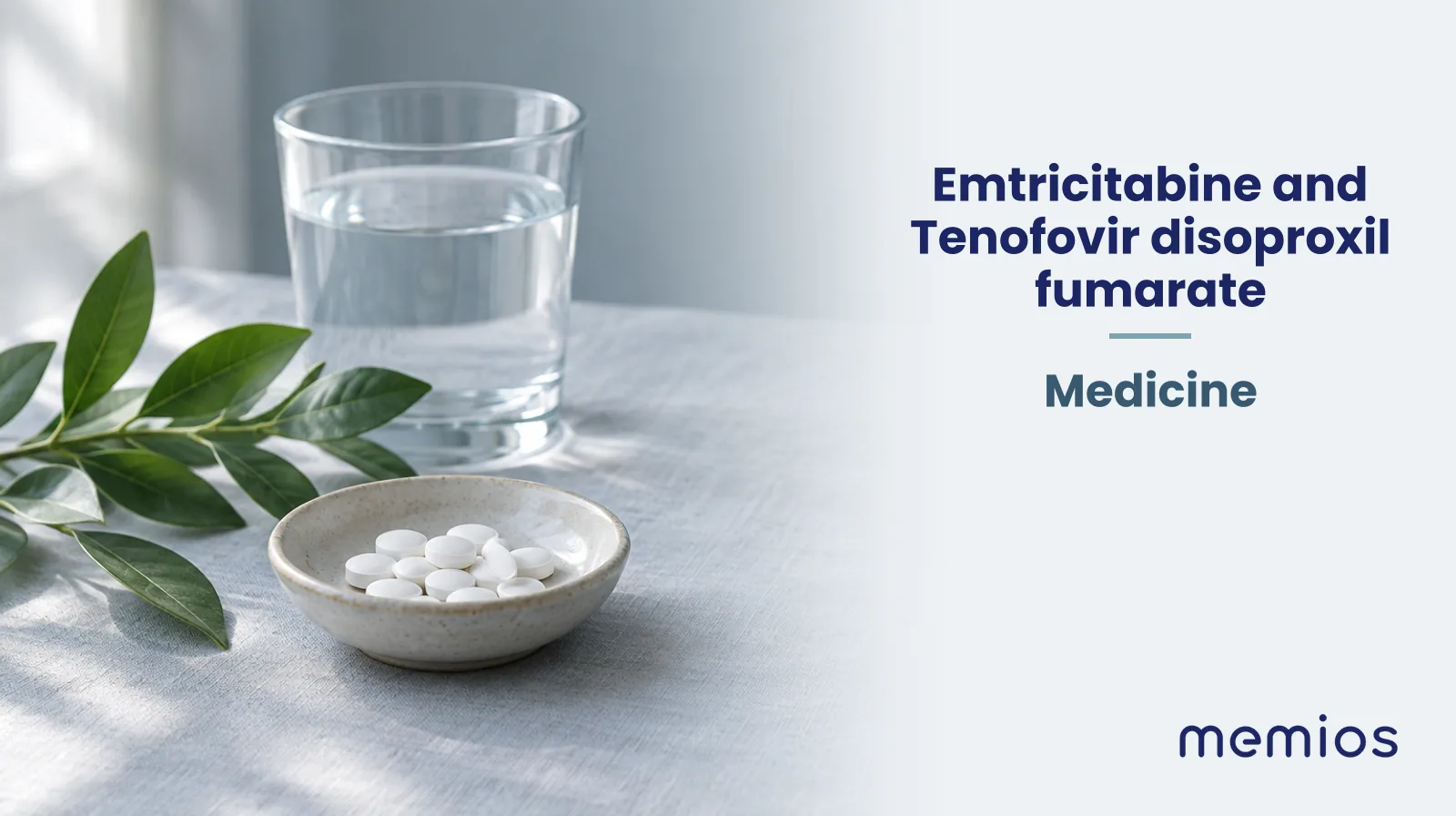Photograph for Emtricitabine and Tenofovir disoproxil fumarate: plain unmarked tablets in a dish beside a glass of water on pale linen.