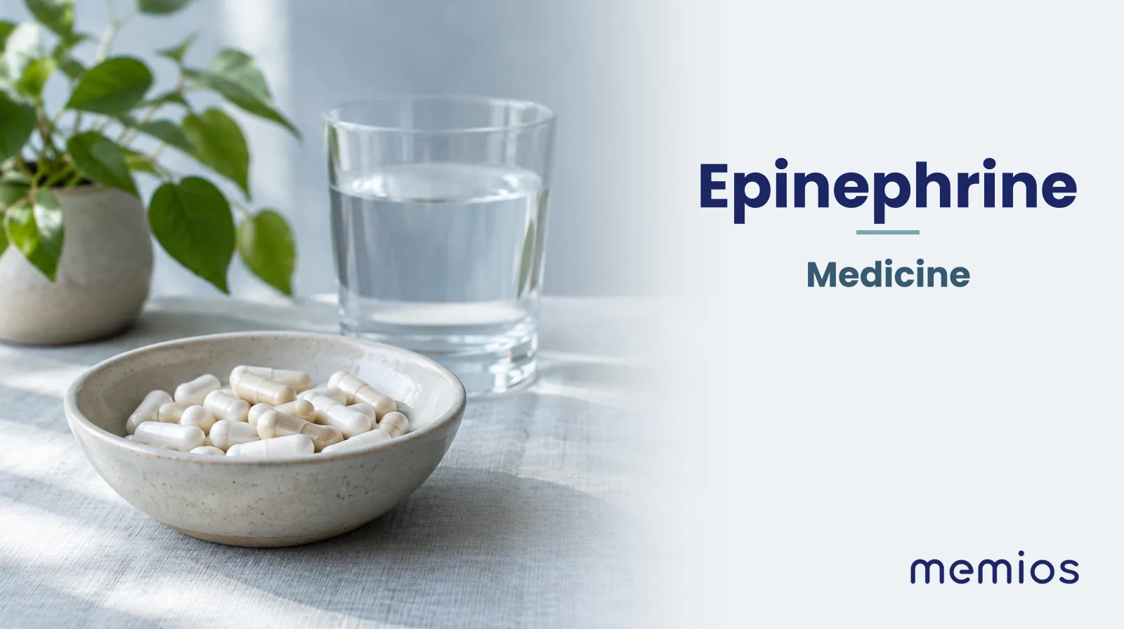 Photograph for Epinephrine: plain unmarked tablets in a dish beside a glass of water on pale linen.
