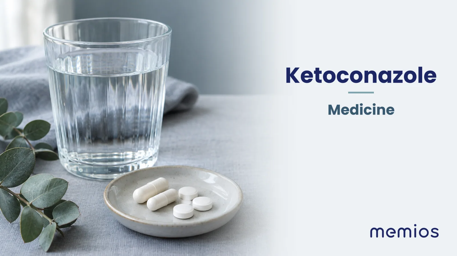 Photograph for Ketoconazole: plain unmarked tablets in a dish beside a glass of water on pale linen.