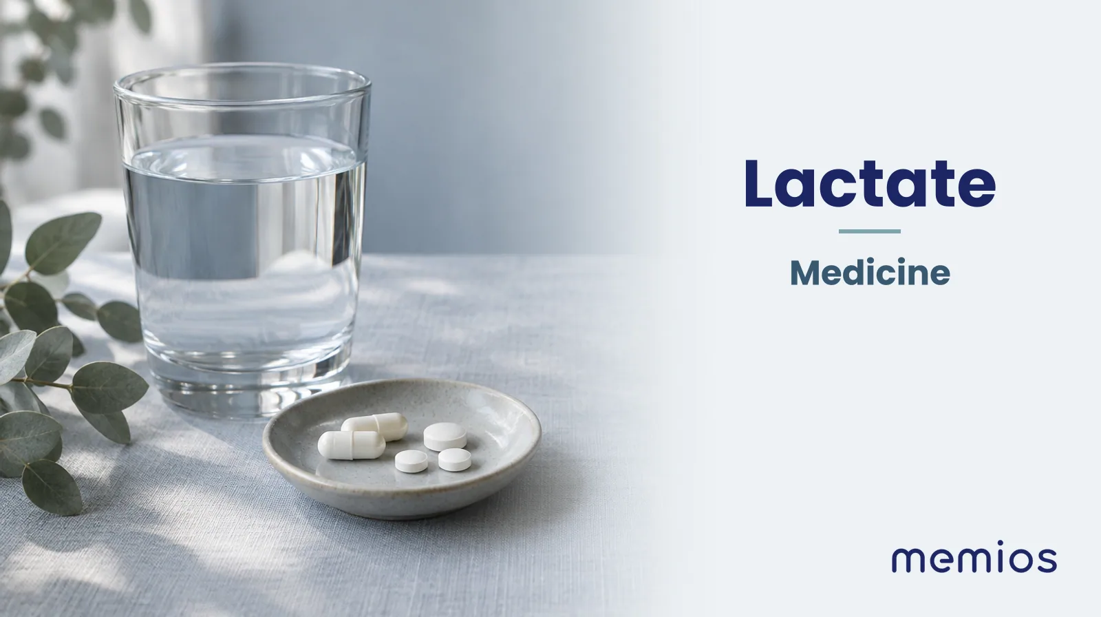Photograph for Lactate: plain unmarked tablets in a dish beside a glass of water on pale linen.