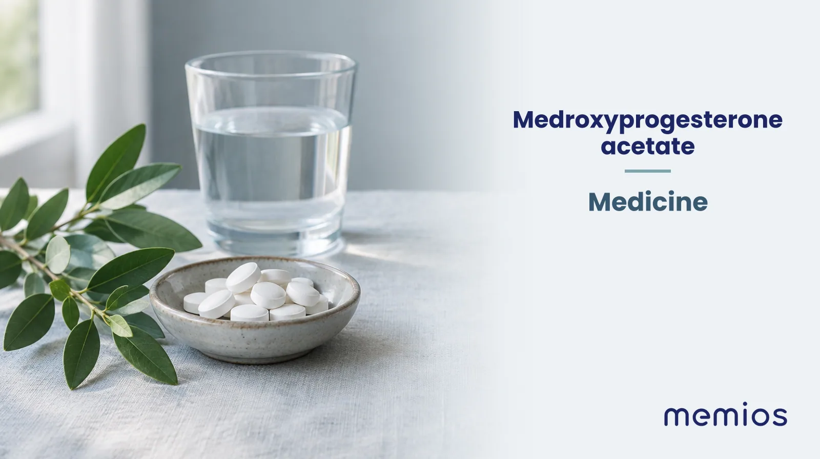 Photograph for Medroxyprogesterone acetate: plain unmarked tablets in a dish beside a glass of water on pale linen.