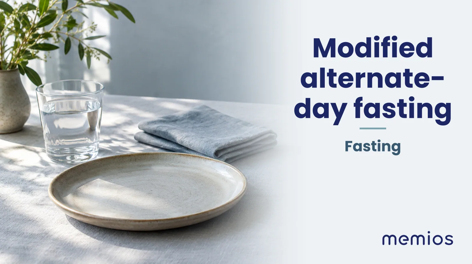 Photograph for Modified alternate-day fasting: a calm table with an empty plate and a glass of water in morning light.
