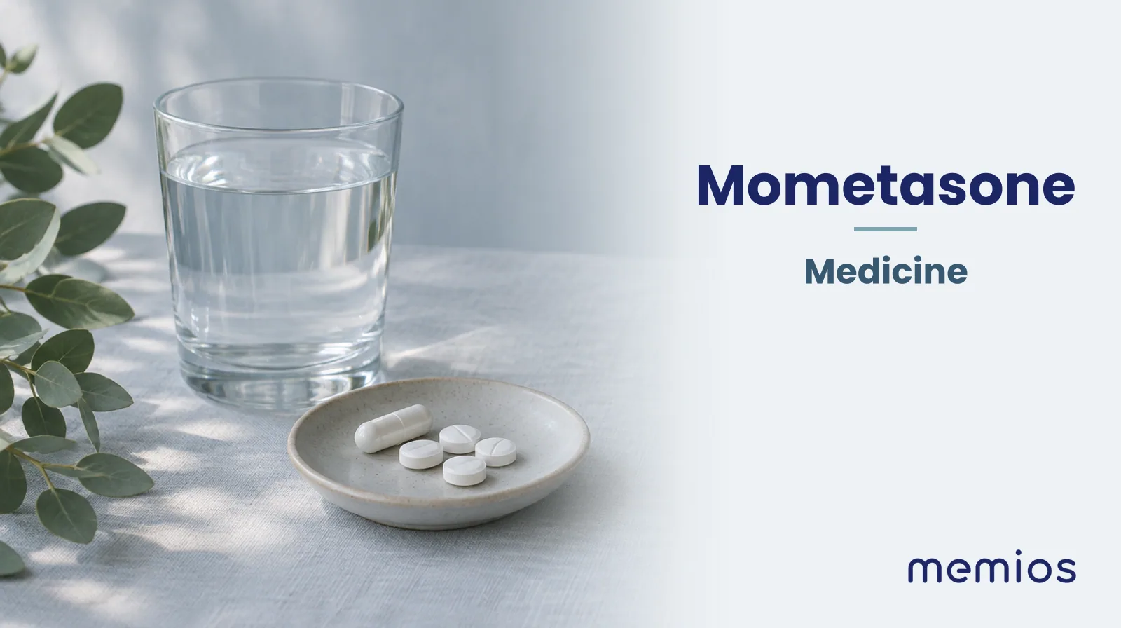 Photograph for Mometasone: plain unmarked tablets in a dish beside a glass of water on pale linen.