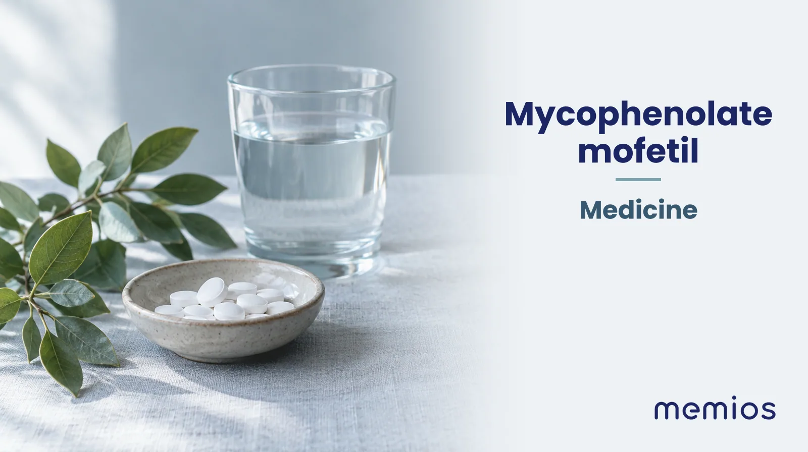 Photograph for Mycophenolate mofetil: plain unmarked tablets in a dish beside a glass of water on pale linen.