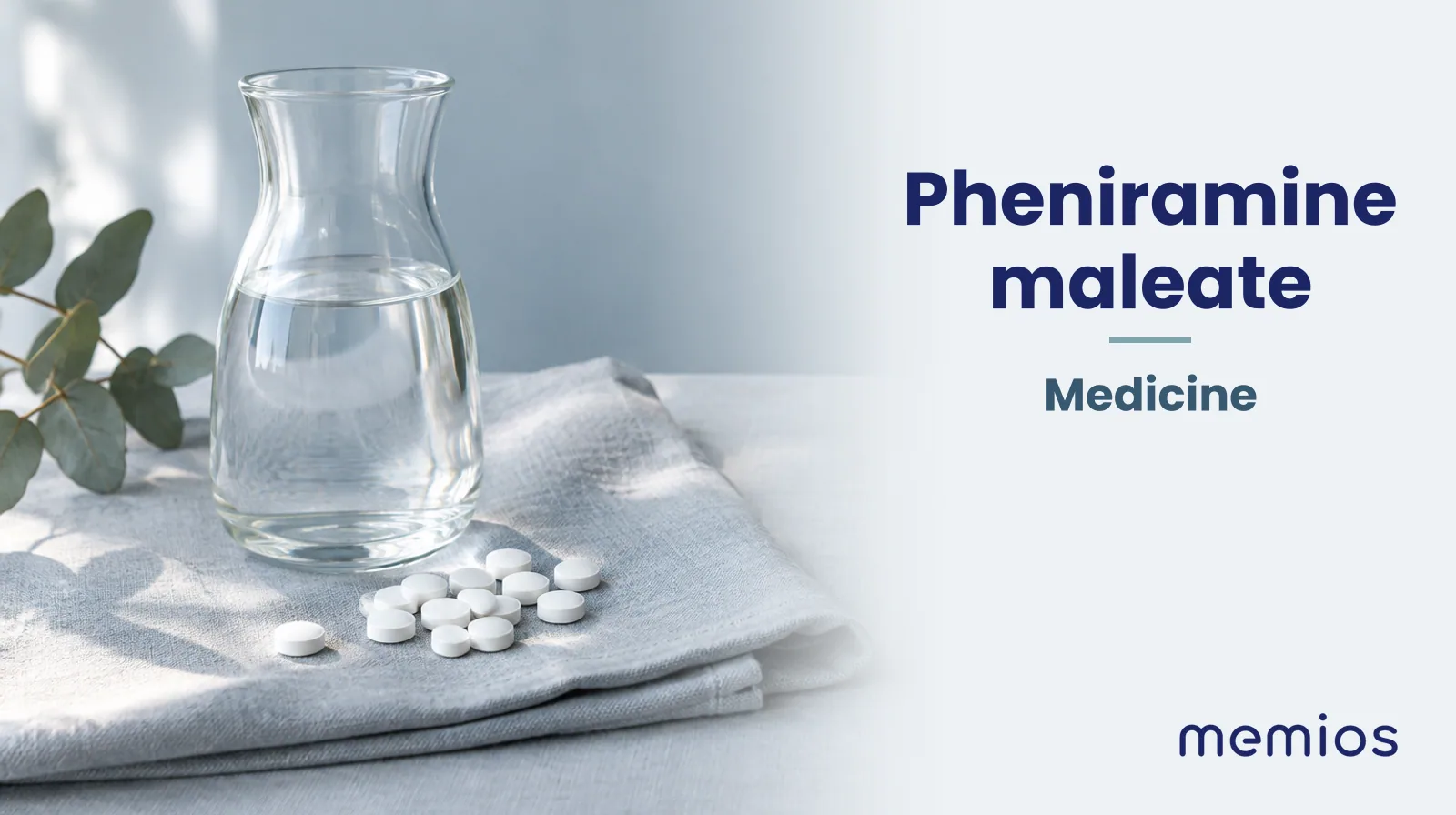 Photograph for Pheniramine maleate: plain unmarked tablets in a dish beside a glass of water on pale linen.