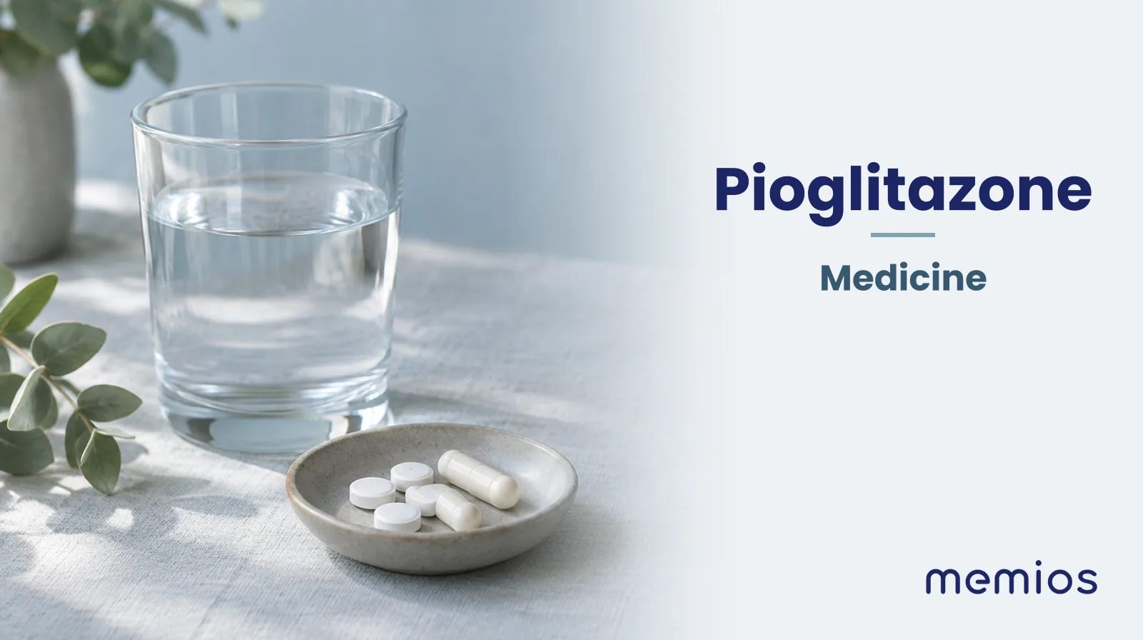 Photograph for Pioglitazone: plain unmarked tablets in a dish beside a glass of water on pale linen.