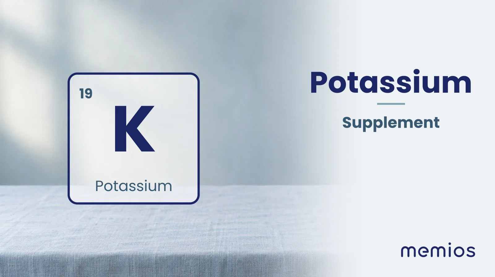 The chemical symbol K for Potassium, drawn on pale linen.