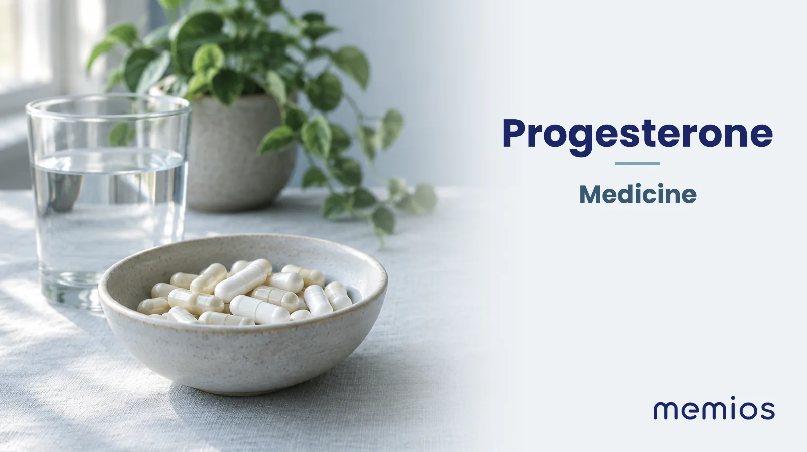 Photograph for Progesterone: plain unmarked tablets in a dish beside a glass of water on pale linen.