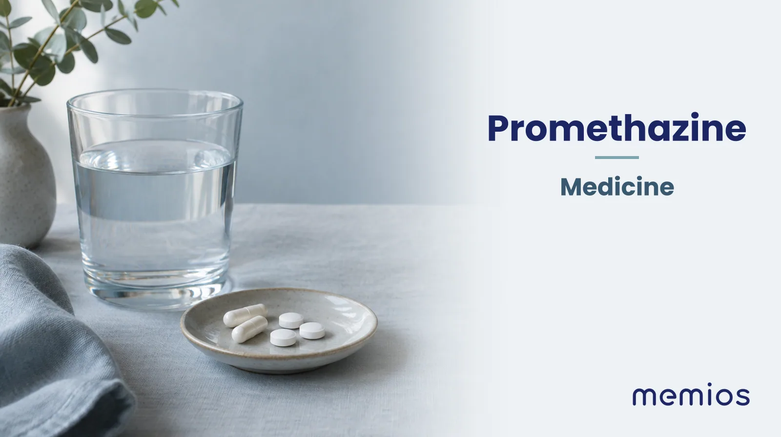 Photograph for Promethazine: plain unmarked tablets in a dish beside a glass of water on pale linen.