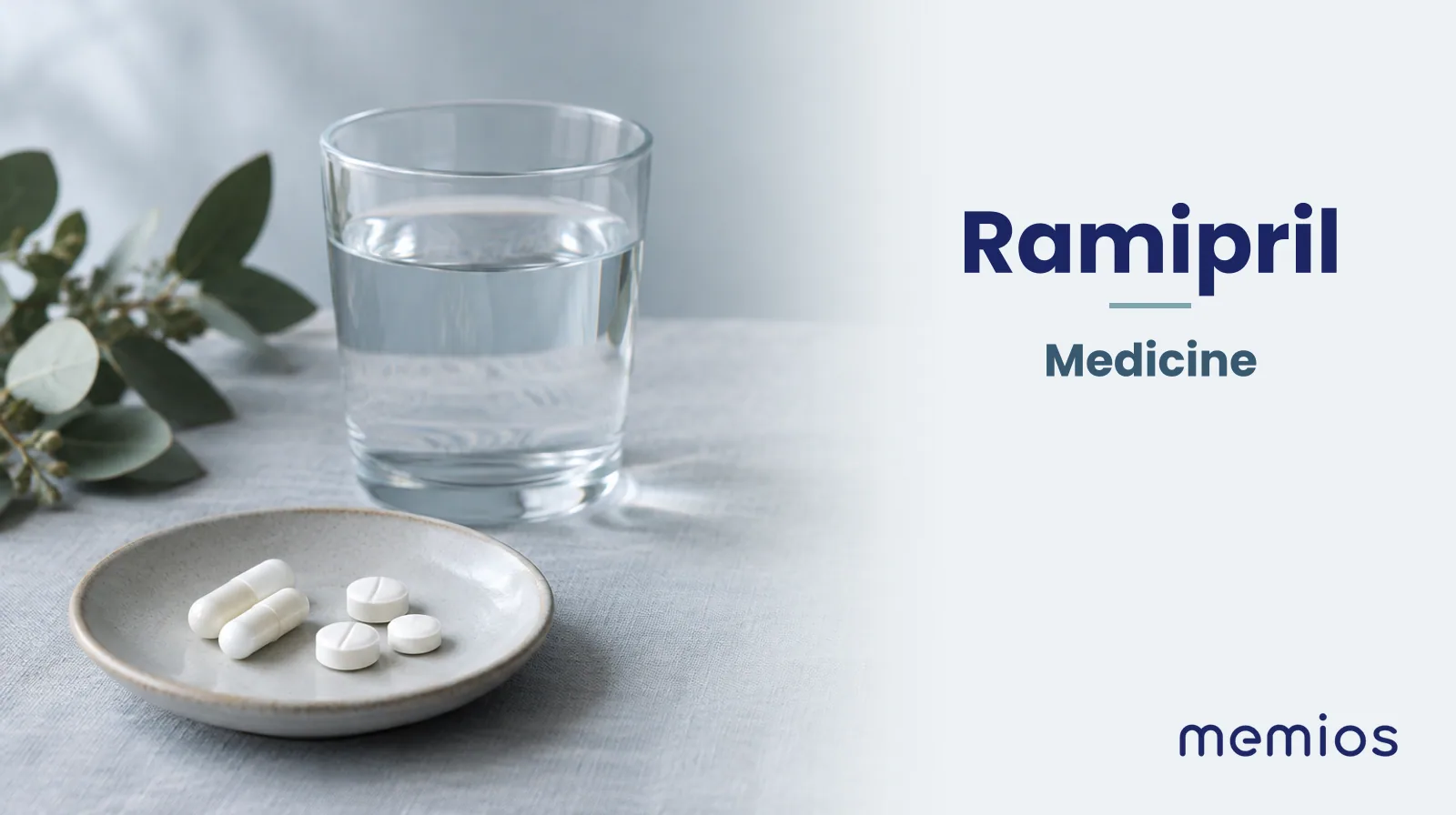 Photograph for Ramipril: plain unmarked tablets in a dish beside a glass of water on pale linen.