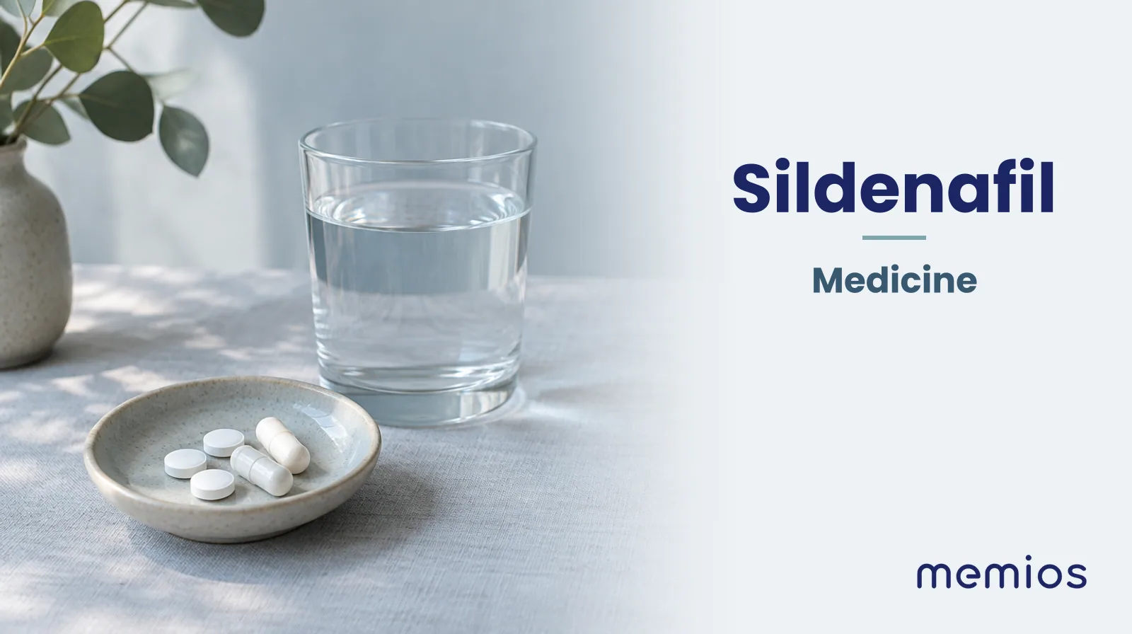 Photograph for Sildenafil: plain unmarked tablets in a dish beside a glass of water on pale linen.