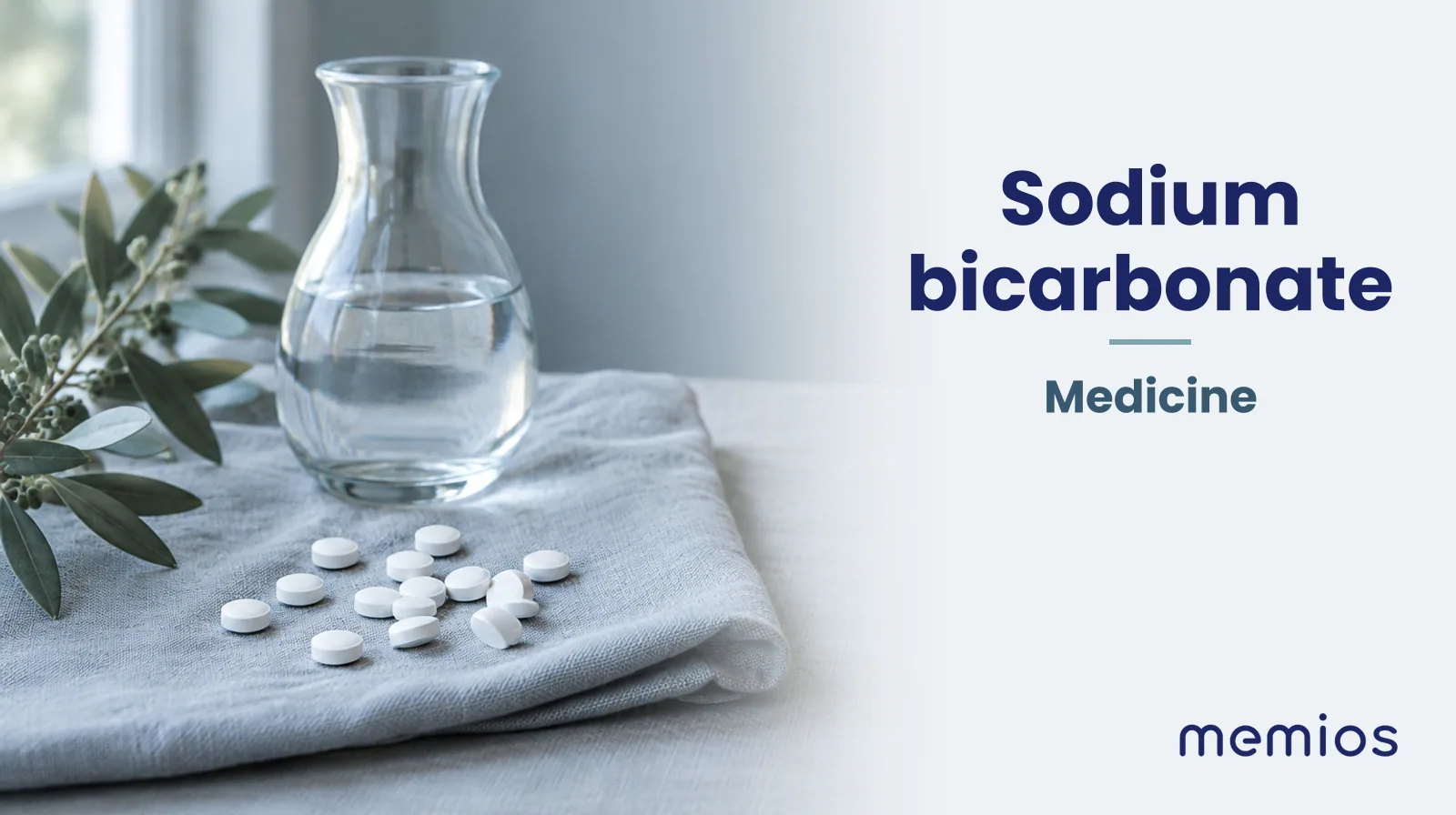 Photograph for Sodium bicarbonate: plain unmarked tablets in a dish beside a glass of water on pale linen.