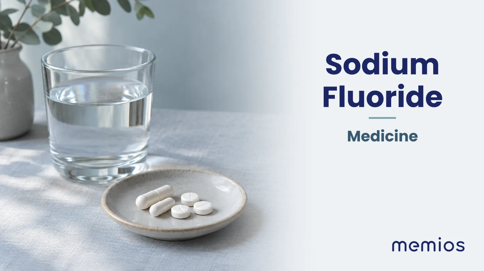 Photograph for Sodium Fluoride: plain unmarked tablets in a dish beside a glass of water on pale linen.