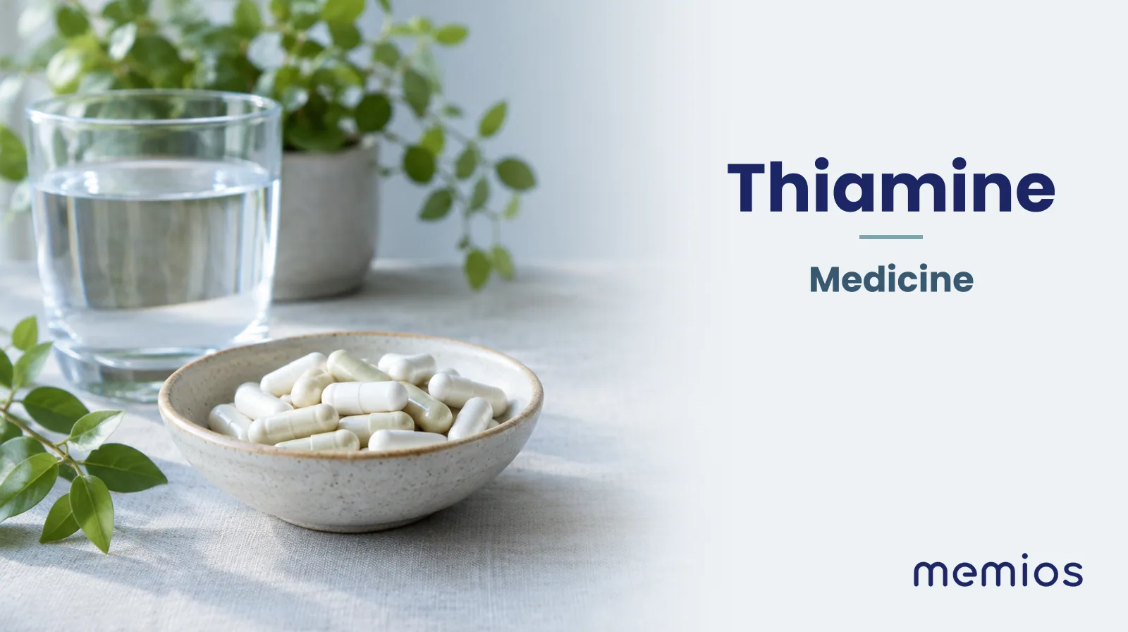 Photograph for Thiamine: plain unmarked tablets in a dish beside a glass of water on pale linen.