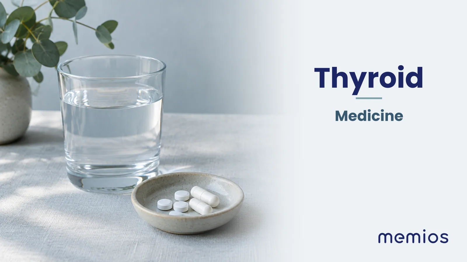 Photograph for Thyroid: plain unmarked tablets in a dish beside a glass of water on pale linen.